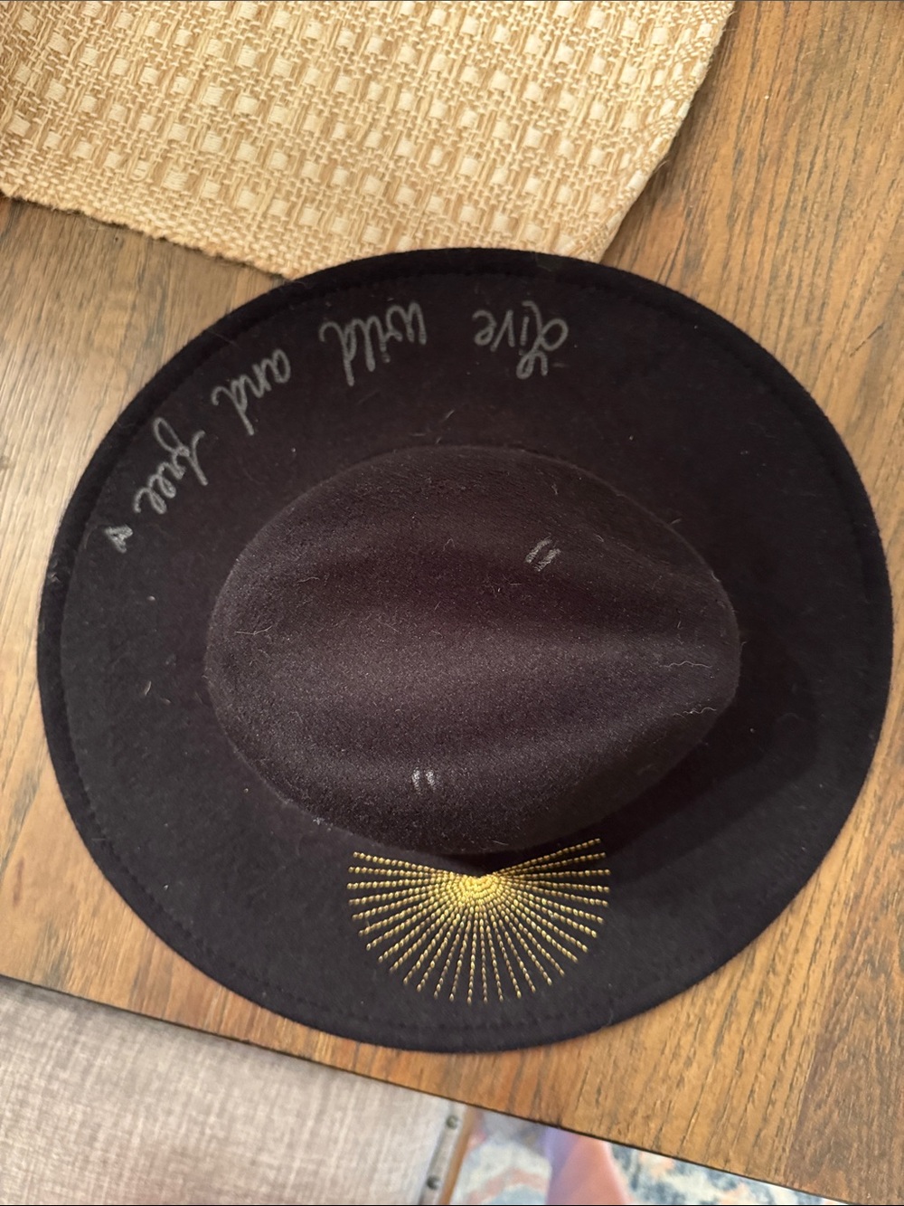 Black Wide-Brim Felt Hat with Gold Sunburst Detail
